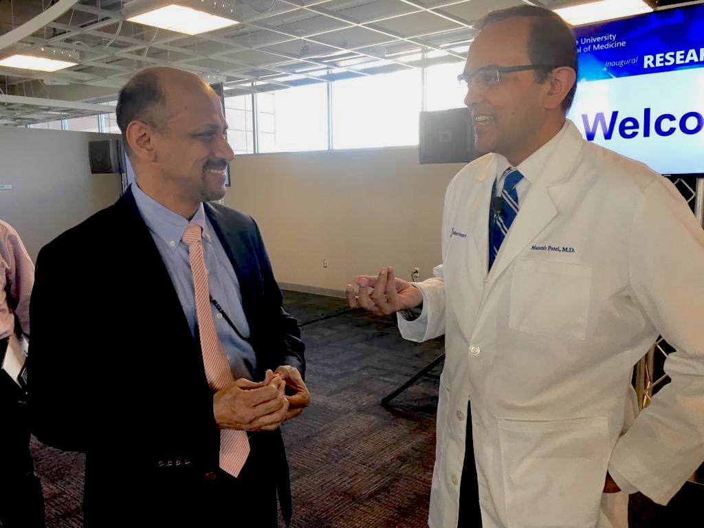 Suresh Balu speaking with Dr. Manesh Patel, Chief, Division of Clinical Pharmacology and Chief, Division of Cardiology